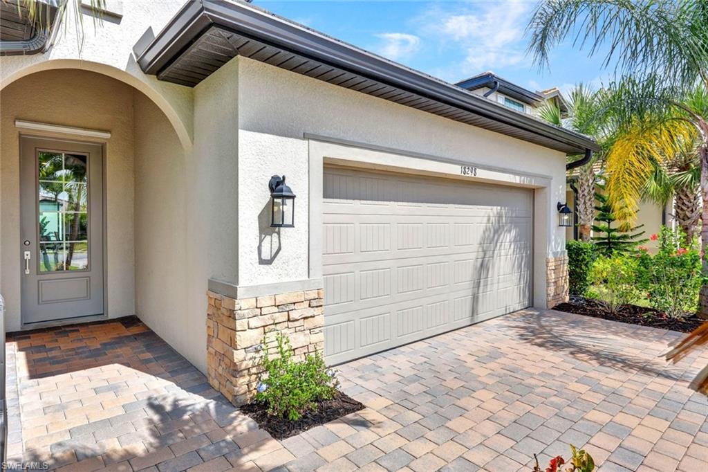 Garage with decorative driveway