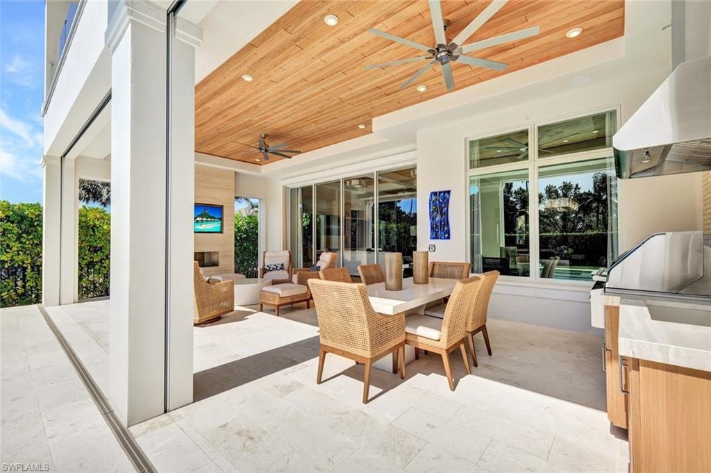 View of patio / terrace with outdoor lounge area and a ceiling fan
