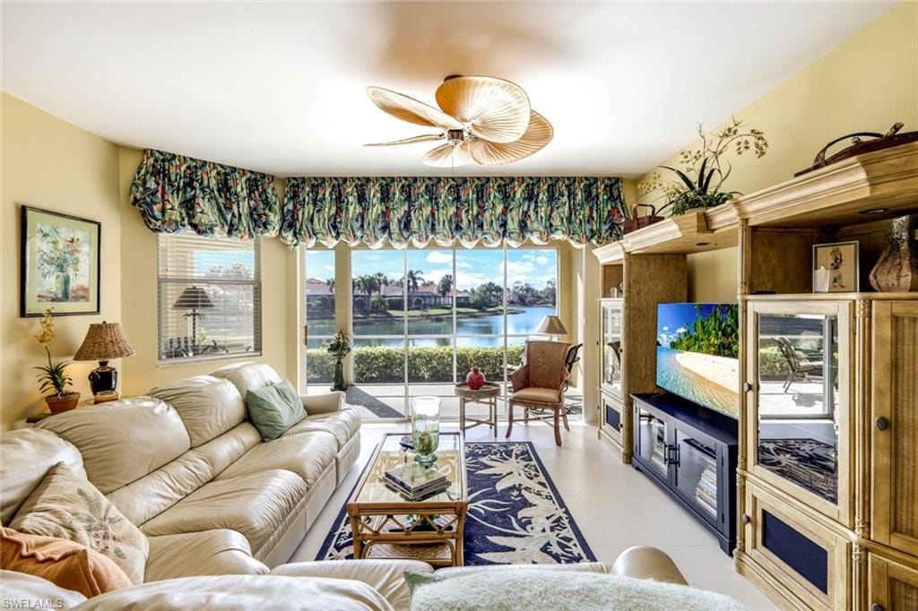 Living area featuring a ceiling fan