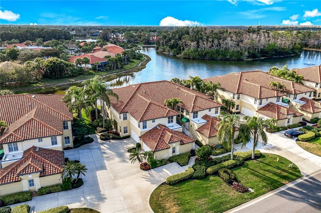 Aerial view of residential area with a nearby body of water