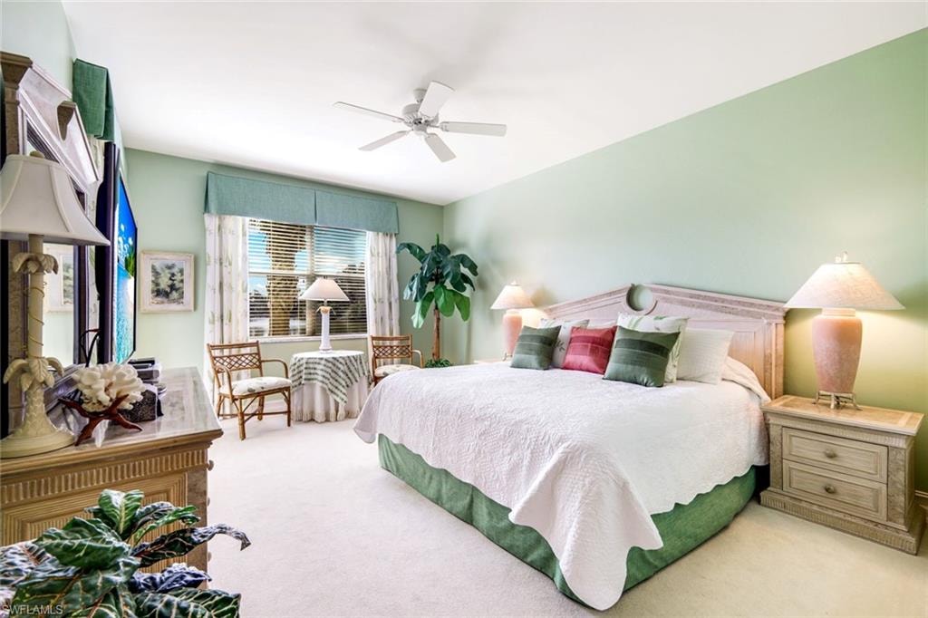 Primary bedroom featuring a ceiling fan