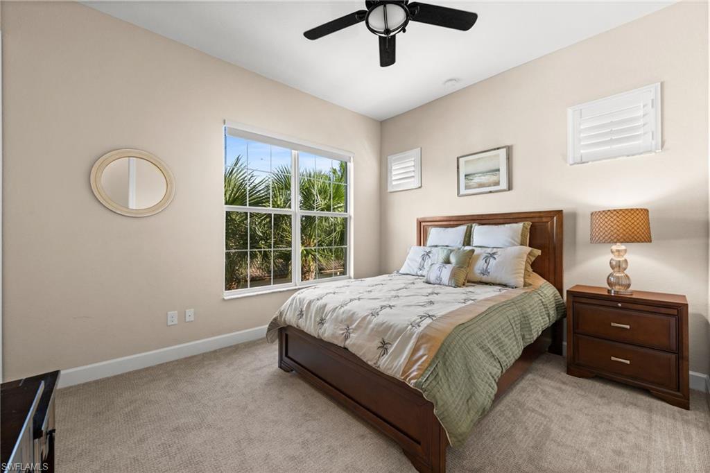 Second guest bedroom with lots of natural light and new plantation shutters