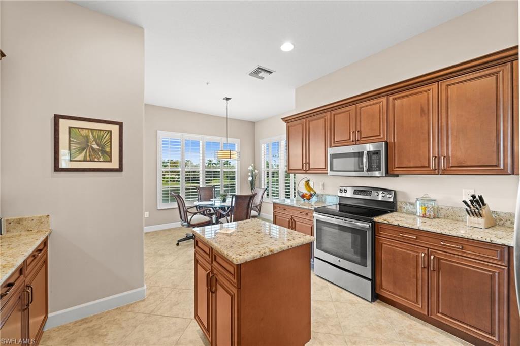 kitchen and eating area with a beautiful view of the Lake