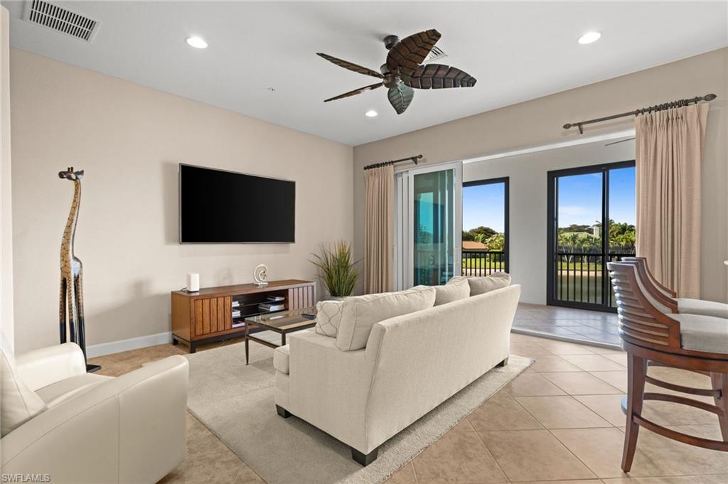 Living room with sliders that pocket creating an indoor outdoor entertaining space