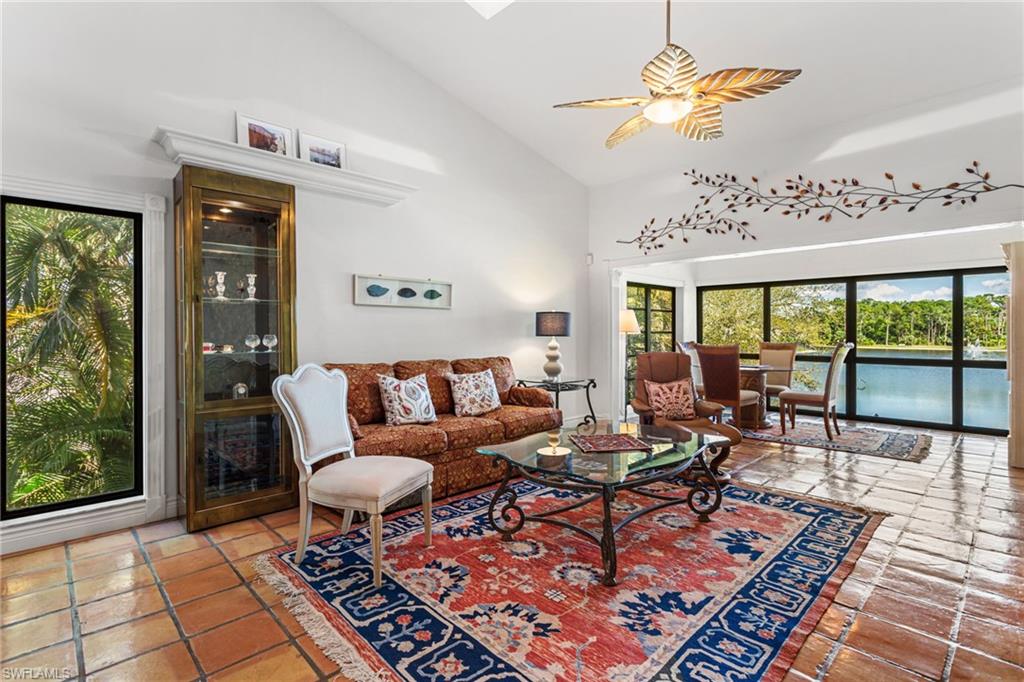 Living area has vaulted ceiling, skylights, ceiling fan and so much room!