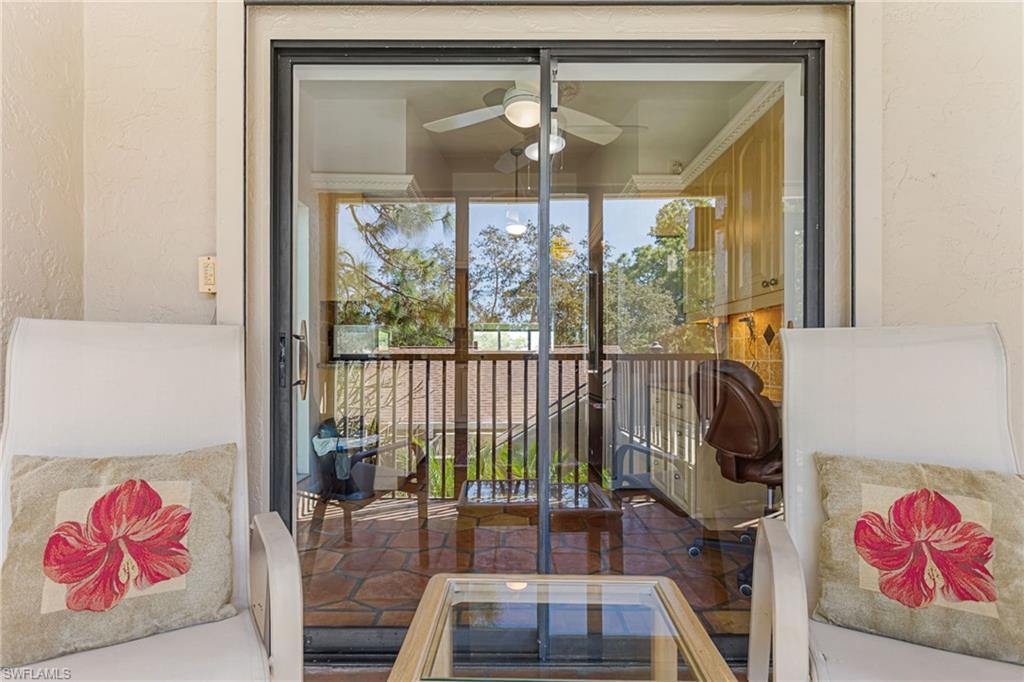 View of screened balcony looking toward kitchen