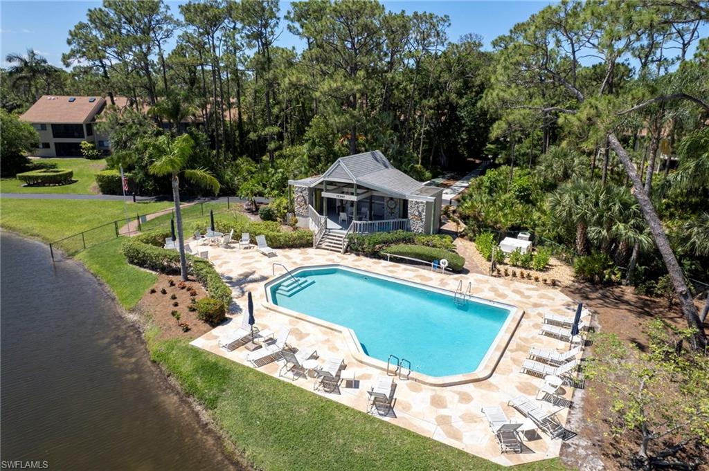 Sandy Pines' community pool is situated luxuriously next to the north lake