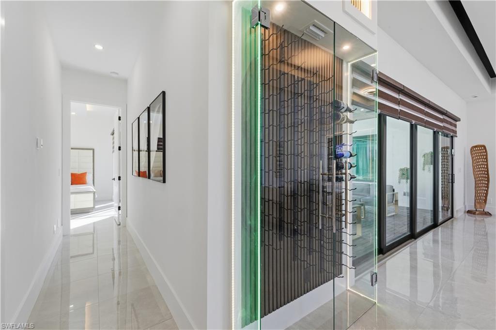 Wine cellar featuring baseboards and recessed lighting