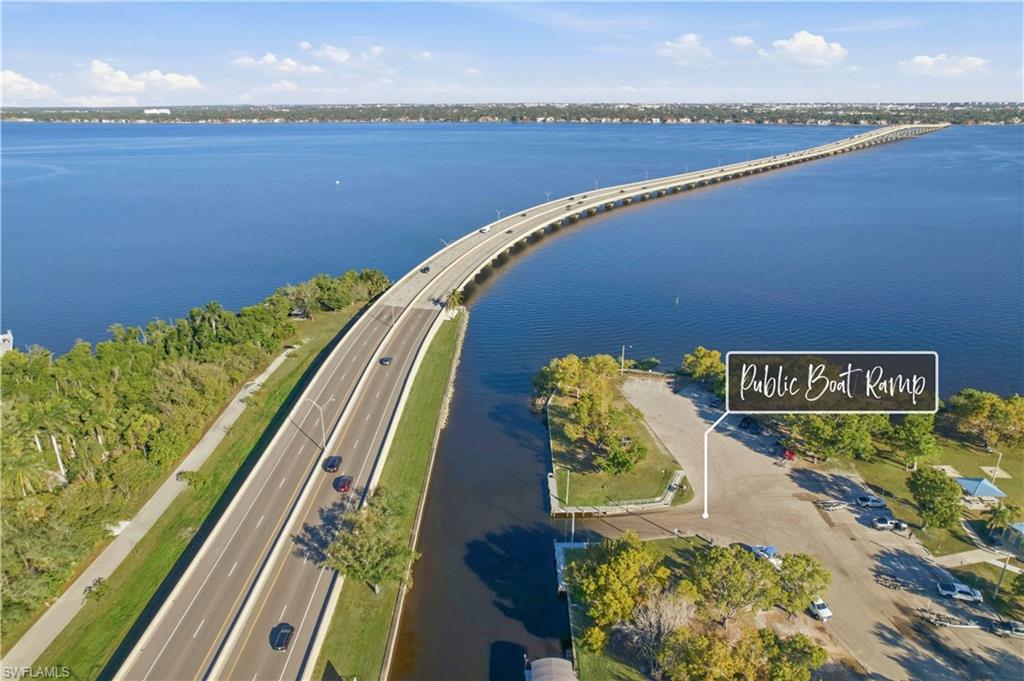 Bird's eye view of a large body of water and a notable bridge