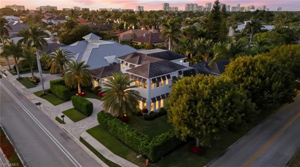 Large corner lot with open green space.
