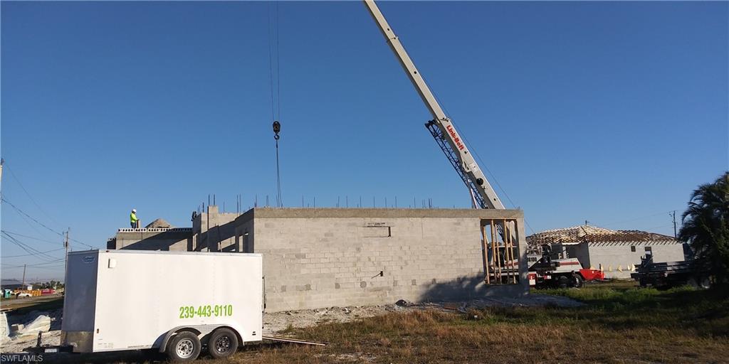 View of home's exterior featuring concrete block siding