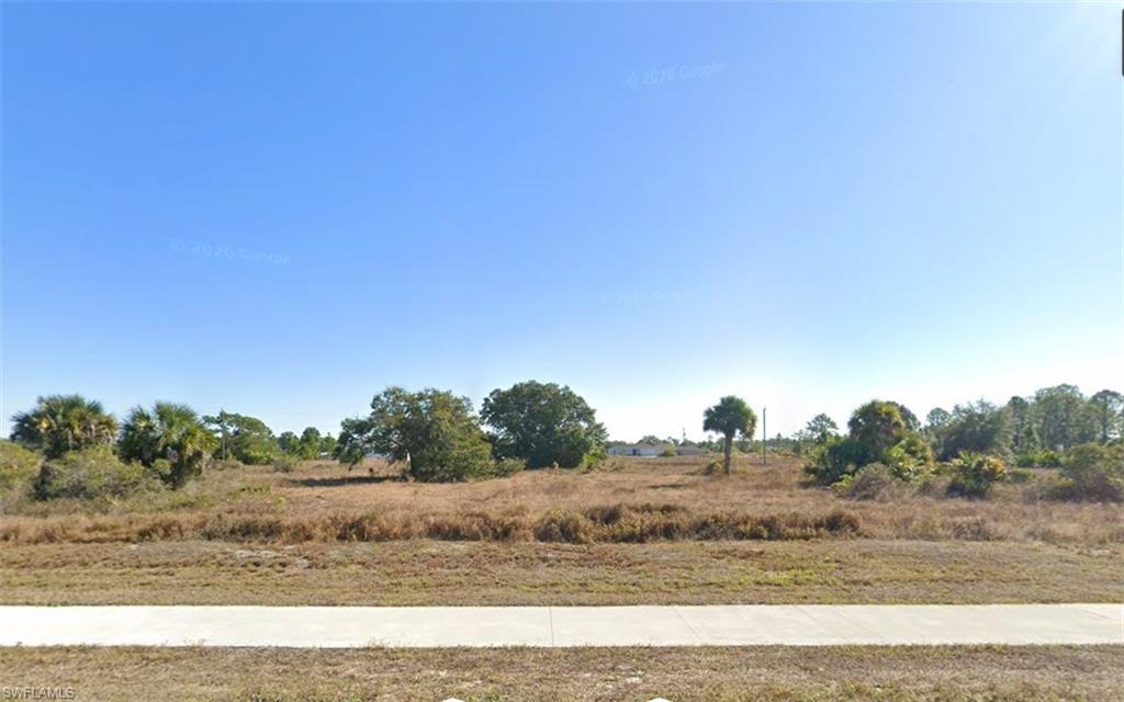 View of yard with a view of rural / pastoral area
