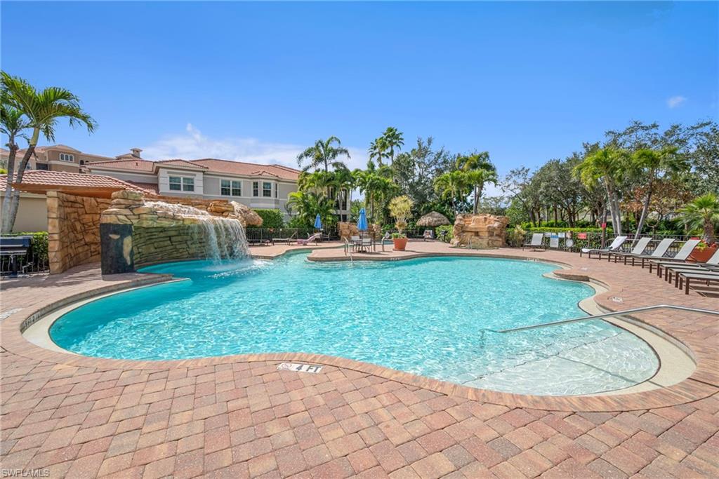 Community pool with a patio area