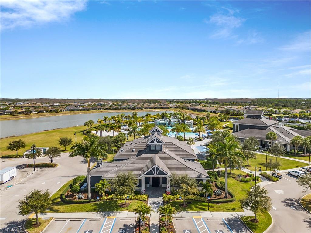Aerial perspective of suburban area with a large body of water