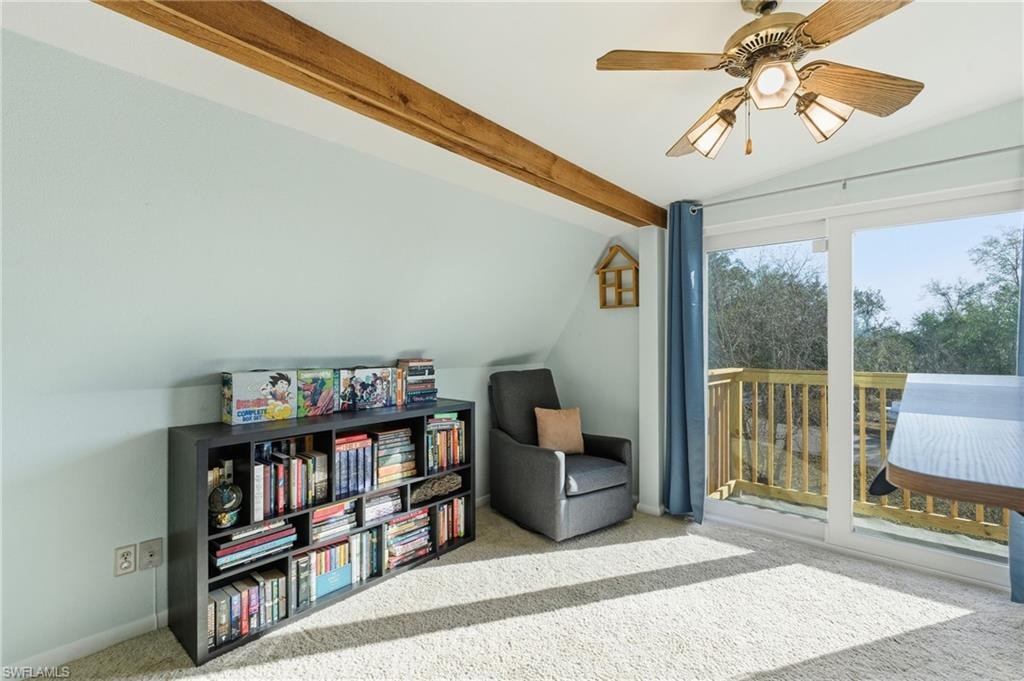 Sitting room with light wood-type flooring and ceiling fan
