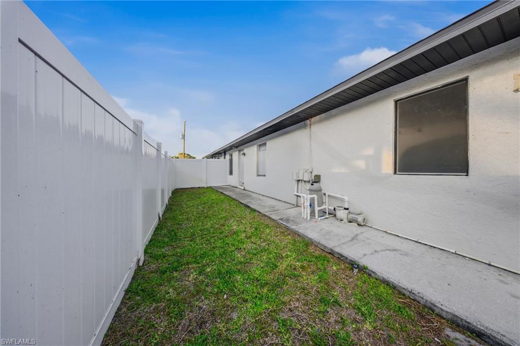 View of fenced backyard