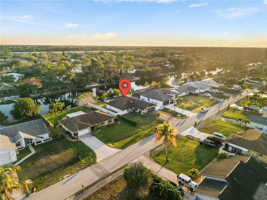 Aerial view at dusk of a residential view and a water view