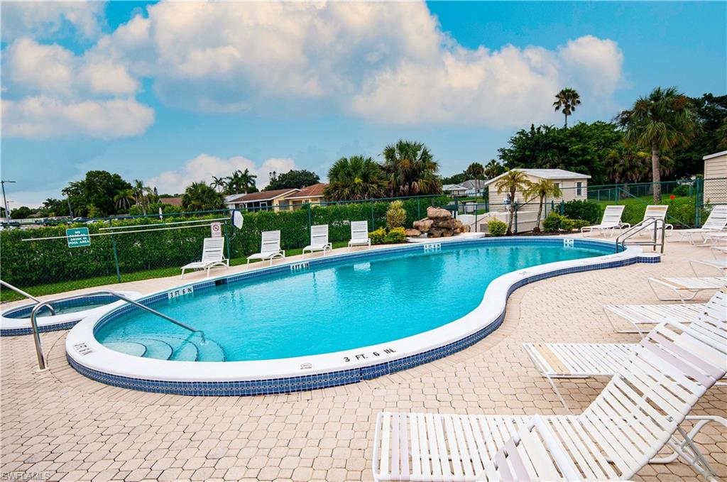 Community pool with a patio area