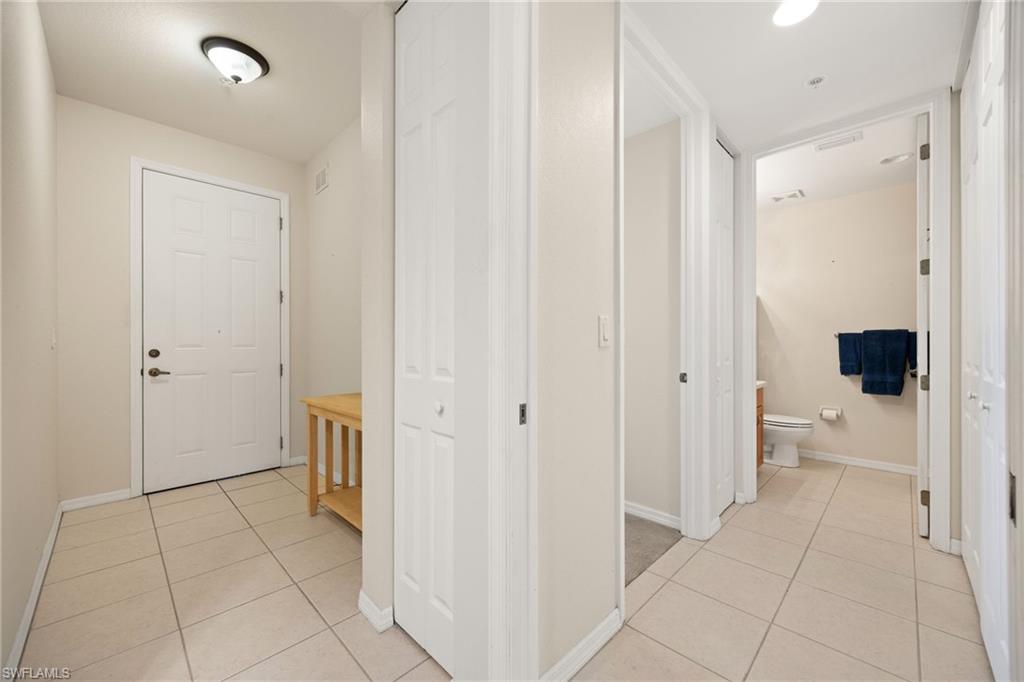 Front Entryway door to outside on the left, hallway to guest bedroom and bath on the right