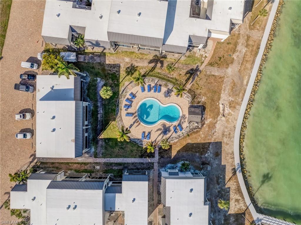 Residents enjoy access to two community pools for relaxing after a day at the beach.