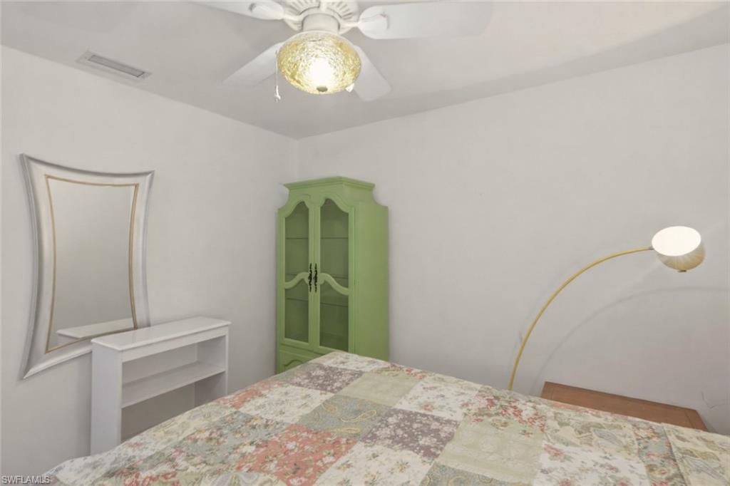 Bedroom featuring a ceiling fan