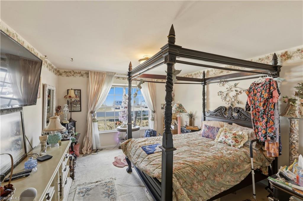 Bedroom featuring carpet floors