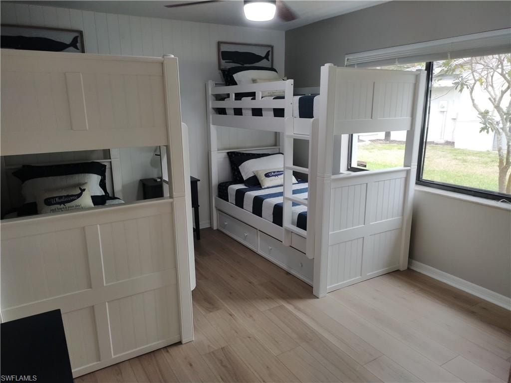 Bedroom featuring light wood-style floors and ceiling fan