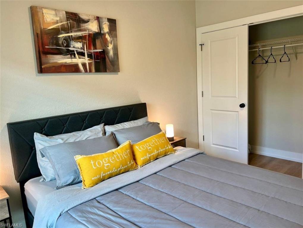 Bedroom featuring a closet and wood finished floors