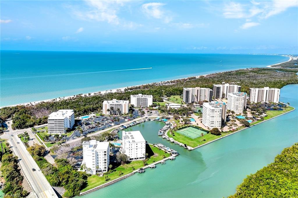 Aerial view of a nearby body of water and apartment complex