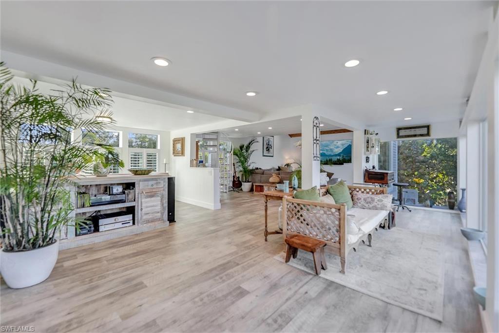 Living room featuring recessed lighting and light wood-type flooring