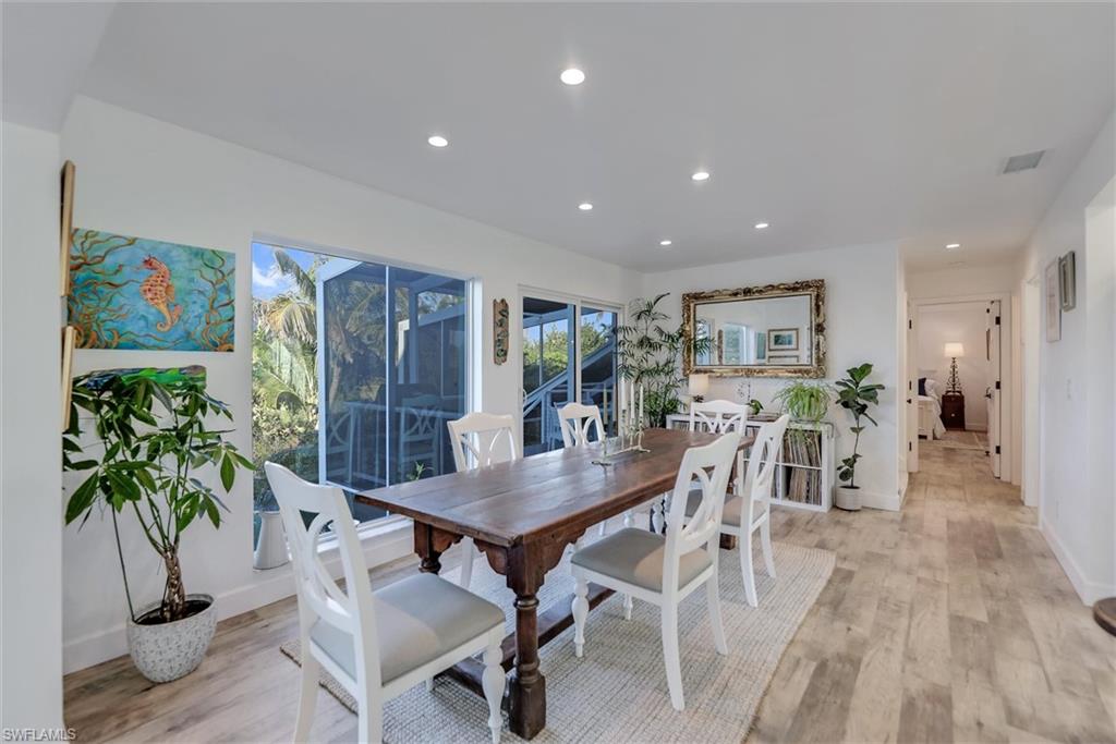 Dining area featuring recessed lighting and light wood-style floors