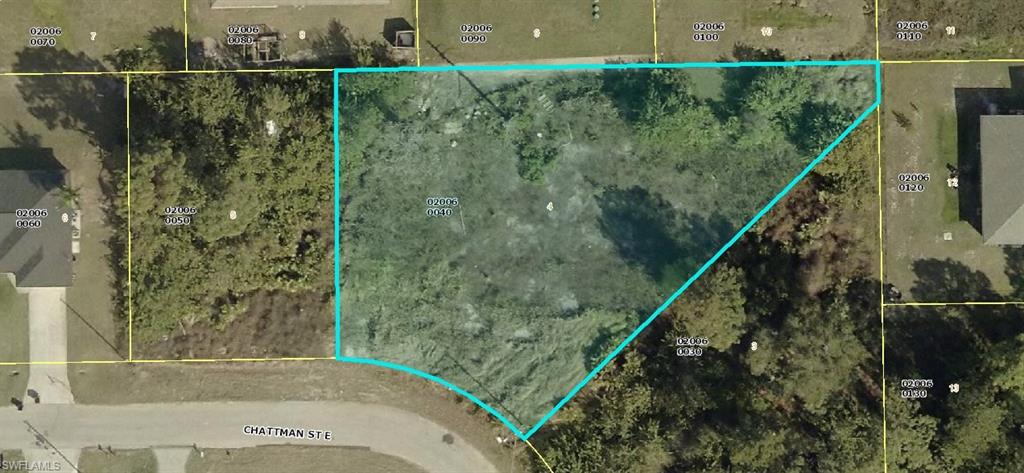 Aerial overview of property's location with property parcel outlined