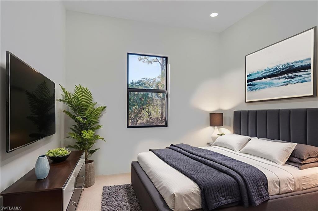 Bedroom with recessed lighting