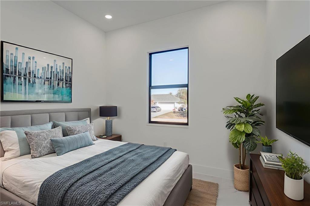 Bedroom with baseboards and recessed lighting
