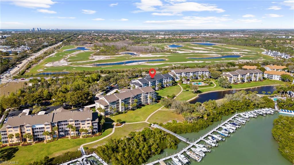 Aerial view of a large body of water and a local golf course