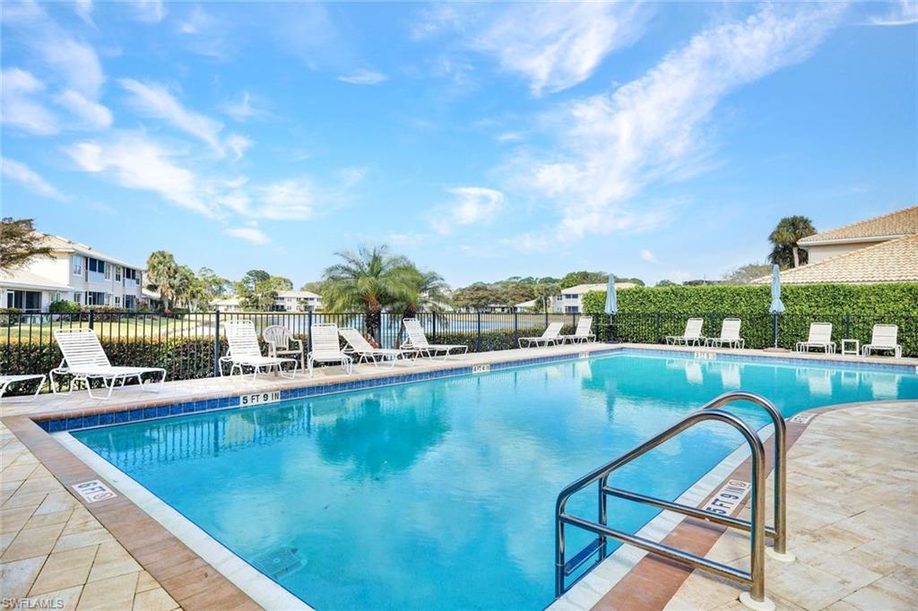 Community pool featuring a patio