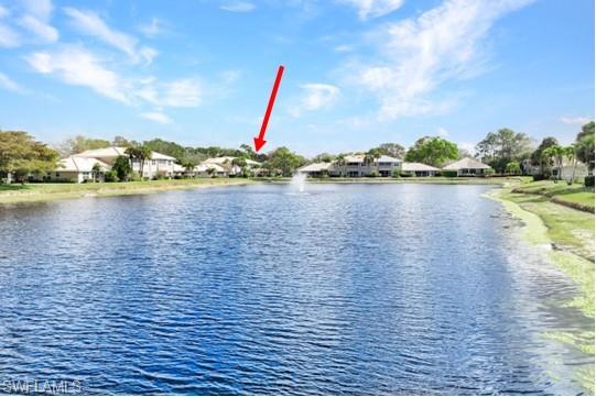 Water view with nearby suburban area