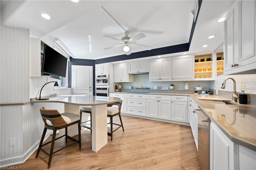 Well-designed kitchen with convenient roll-out drawers.