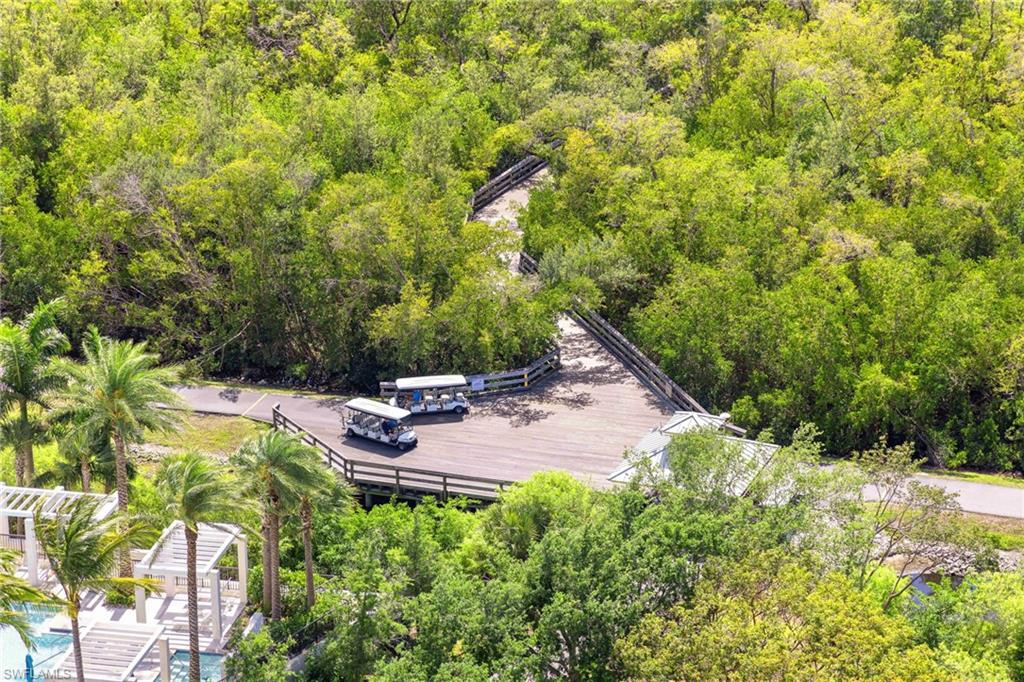 Hop on a tram right outside your building for convenient travel to Pelican Bay's beaches and restaurants.  A unique nature-filled experience!