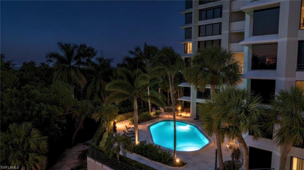 Large pool & spa with preserve view and privacy!  2 guest suites available for owner's use, renovated community room & gym, private tennis & pickleball court, secure under-building parking & separate storage, live-in & on-site management & capability of electric vehicle charging in the garage.