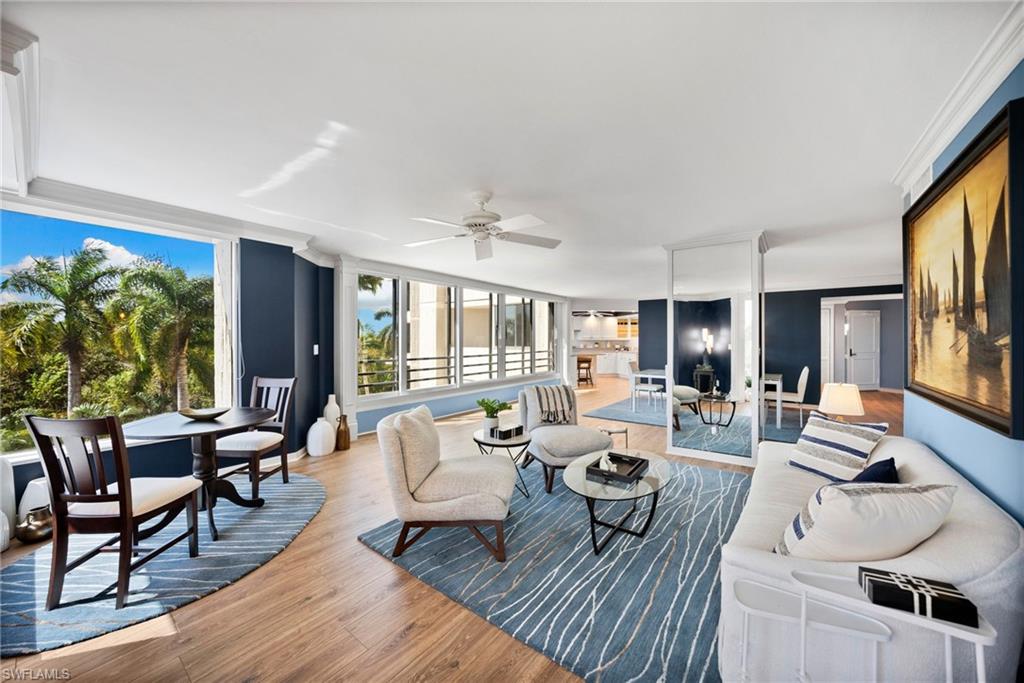 Boasting a breathtaking view of the tranquil untouched nature preserve & lush swaying palm trees—your very own tropical oasis in the coveted “Heron at Pelican Bay.”