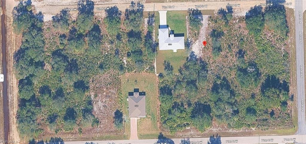 Aerial view of property and surrounding area