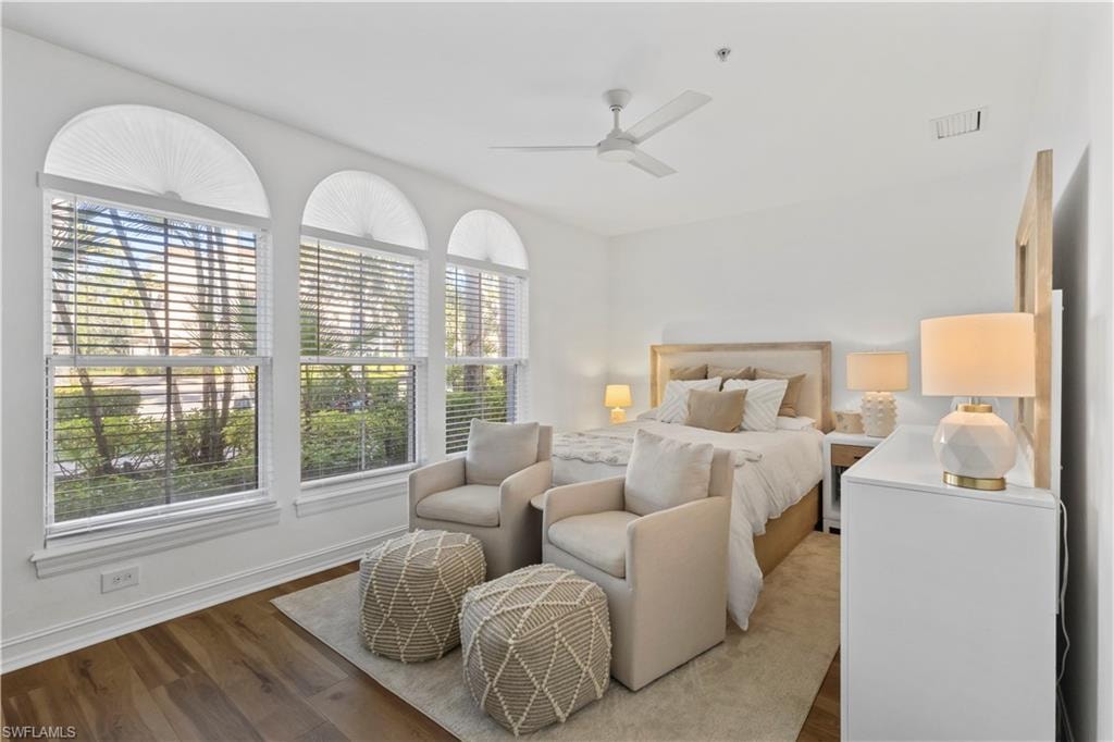Bedroom featuring wood finished floors and ceiling fan