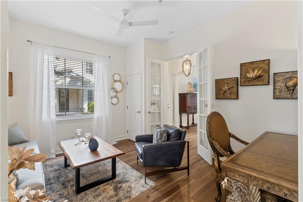 Office area featuring wood finished floors and a ceiling fan