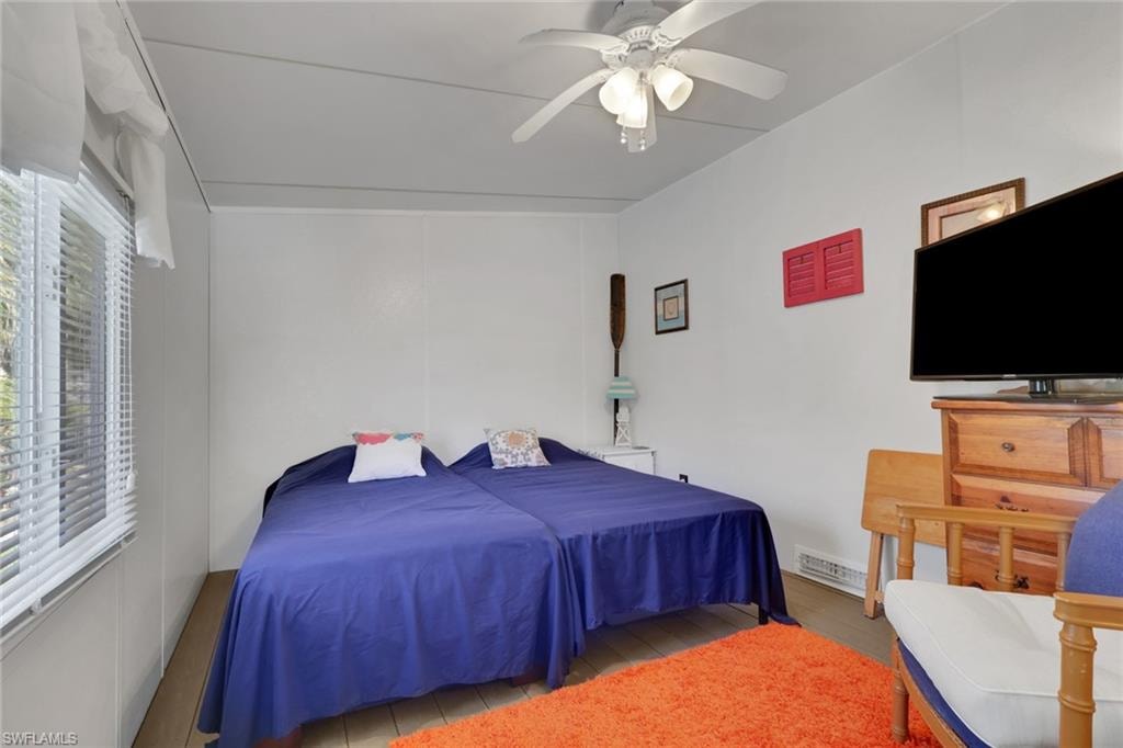 Bedroom featuring a ceiling fan
