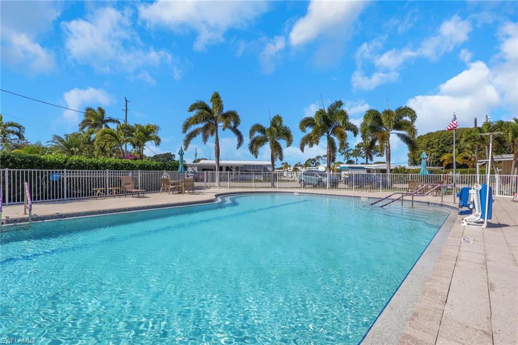 Community pool with a patio area