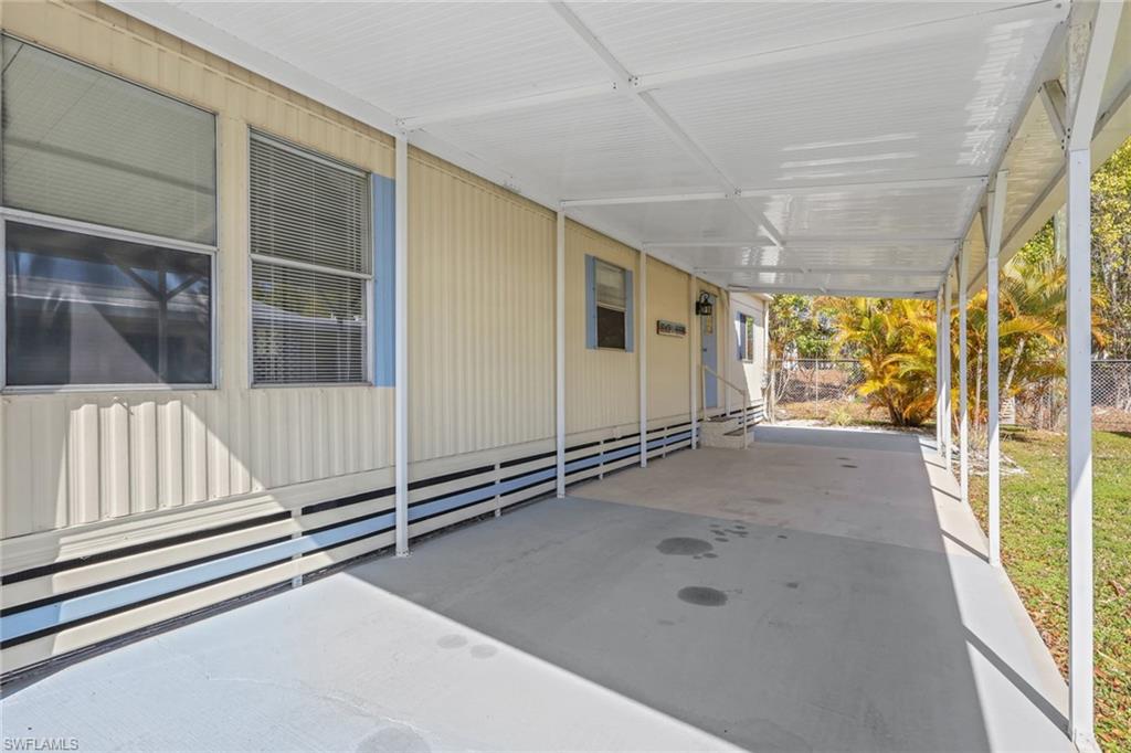 View of patio featuring a carport