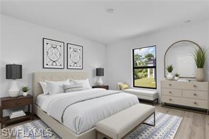 Bedroom with light wood-style floors