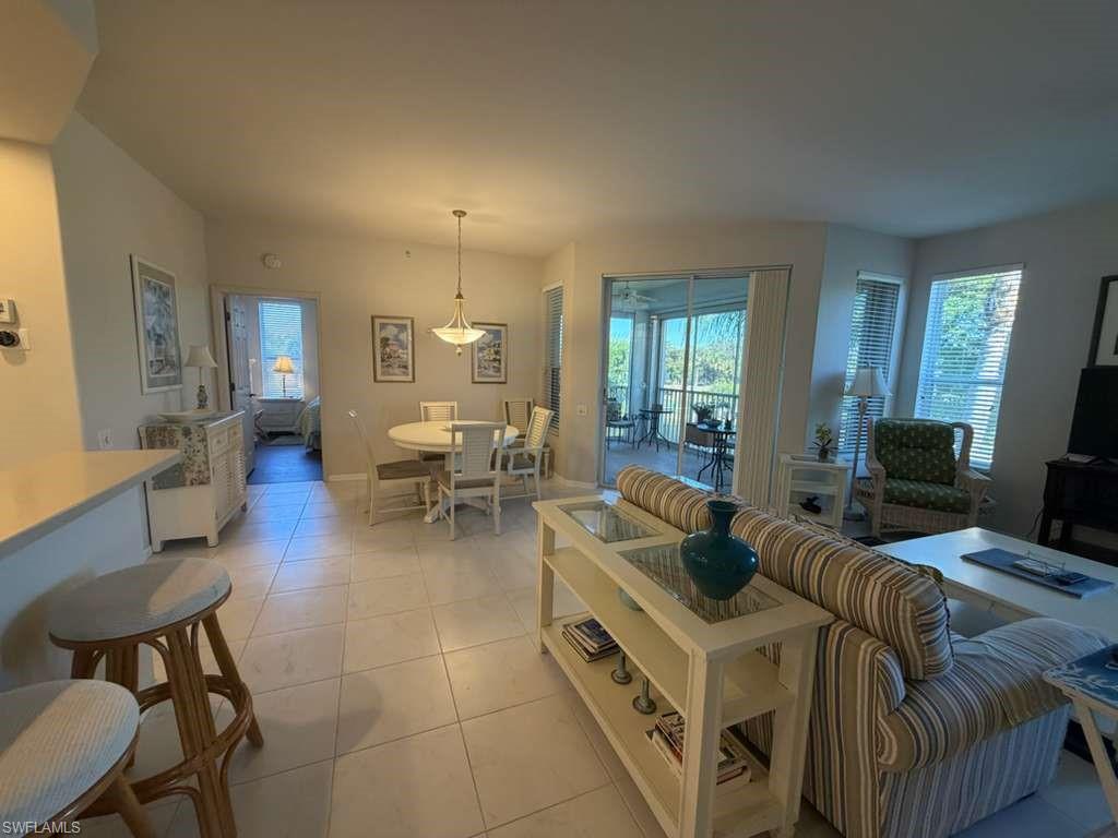 Living room featuring light tile patterned flooring