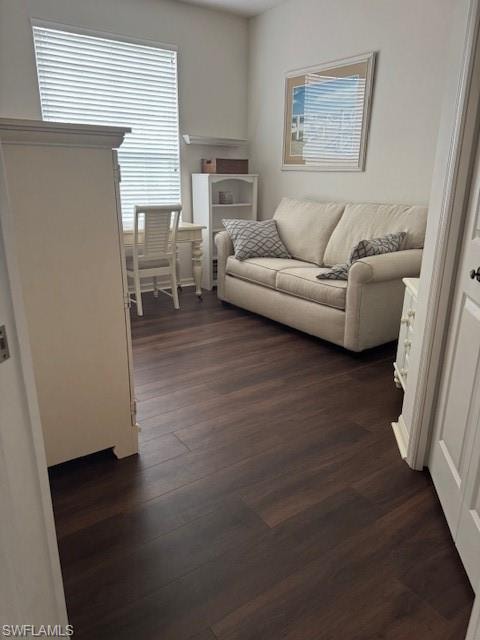Living room featuring dark wood finished floors